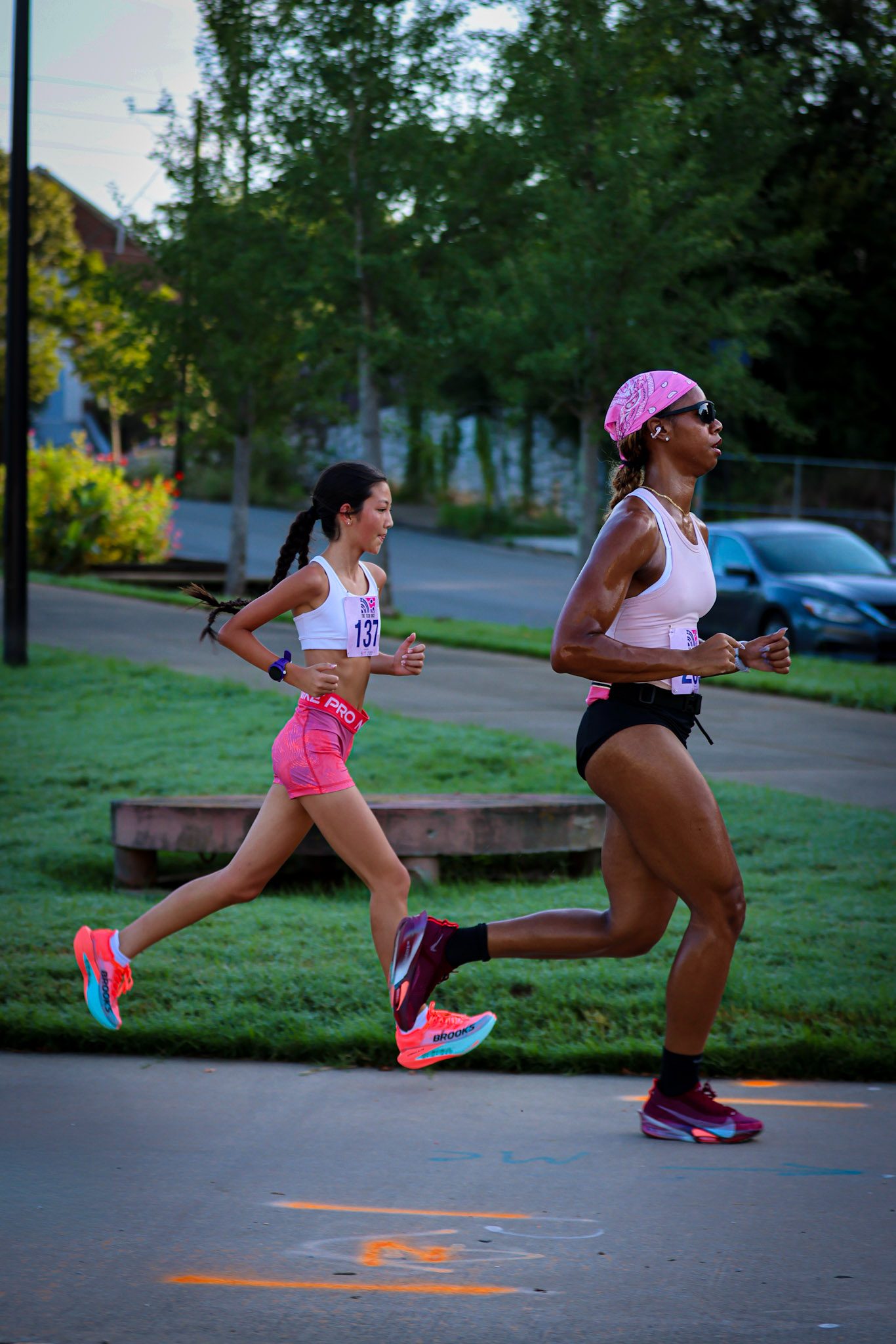 Two runners in stride